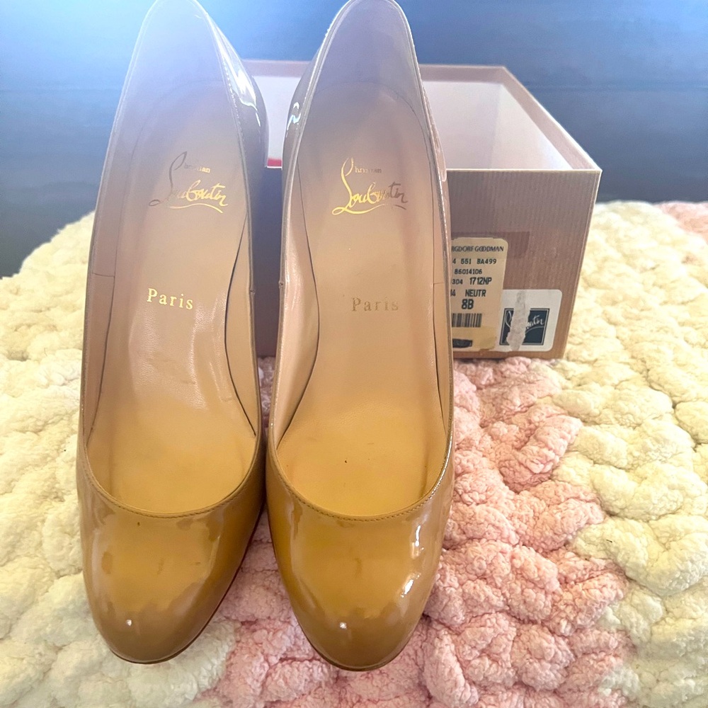 Christian Loubutin 3 inch heels with shiny tan color, size 8m